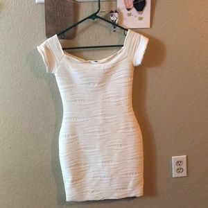 Off white dress. Modeled below.